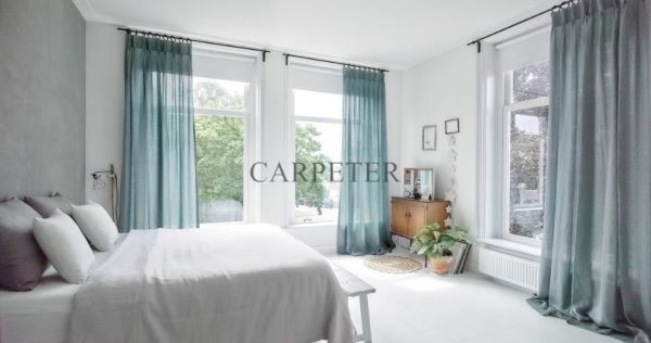 White Color Wall With Grey Curtains