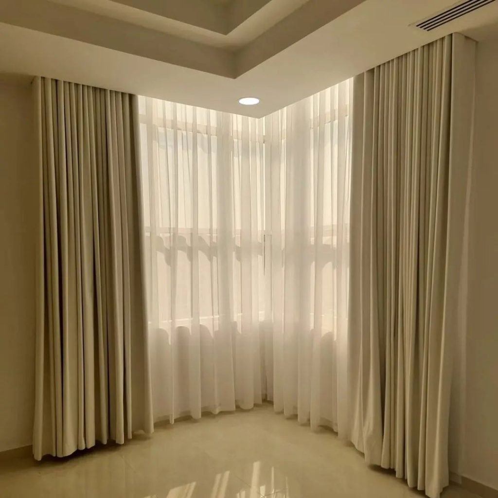 Floor-To-Ceiling Sheer Curtains in Corner Window Bur Dubai