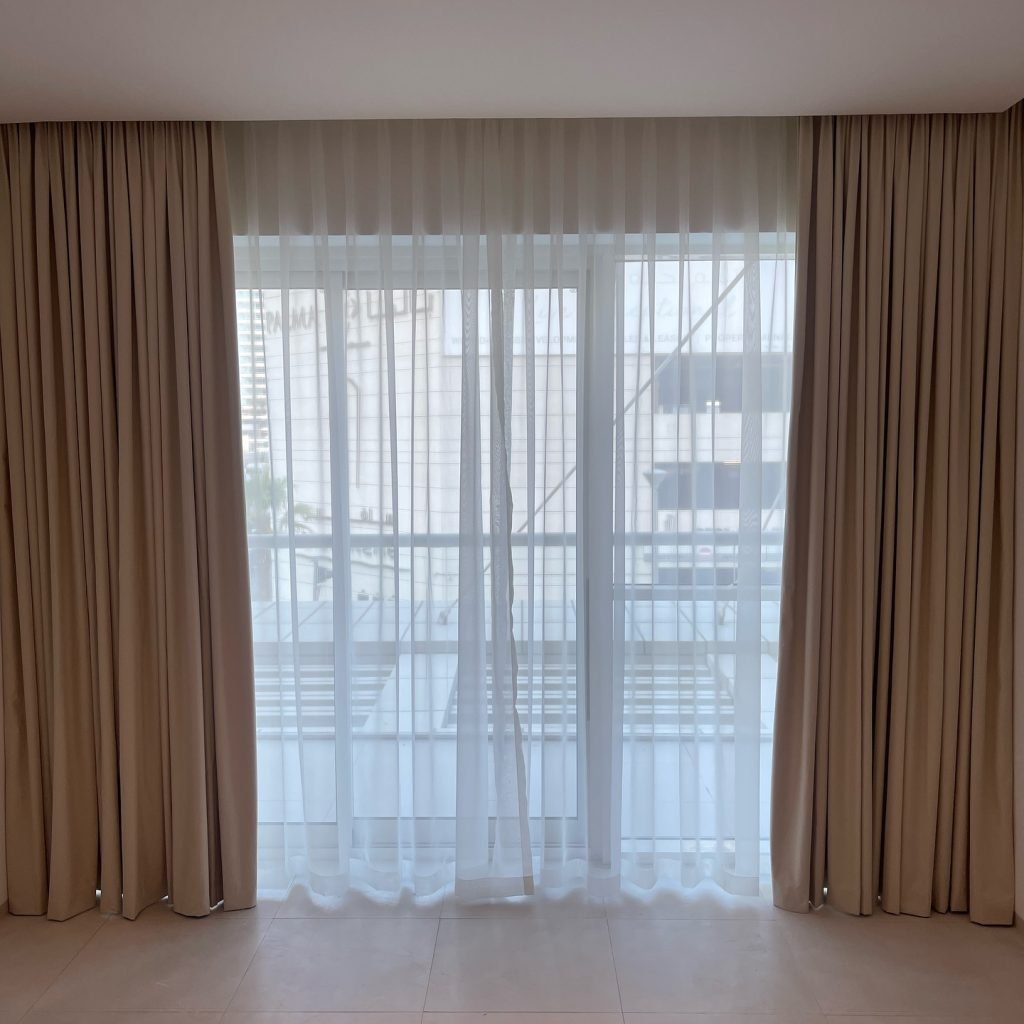 Soft Sheer Curtains with Beige Side Drapes Installation in Dubai Creek