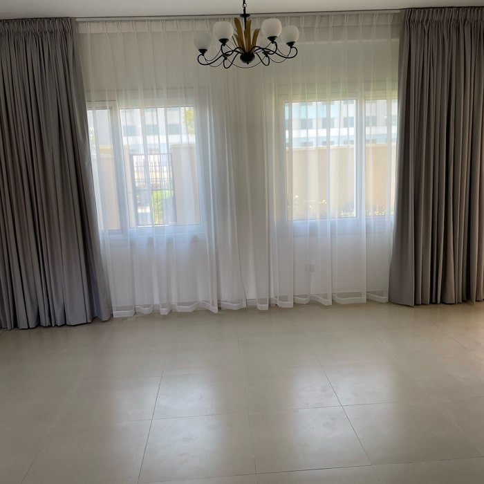 with Grey Blackout Drapes Installation in Palm Jumeirah