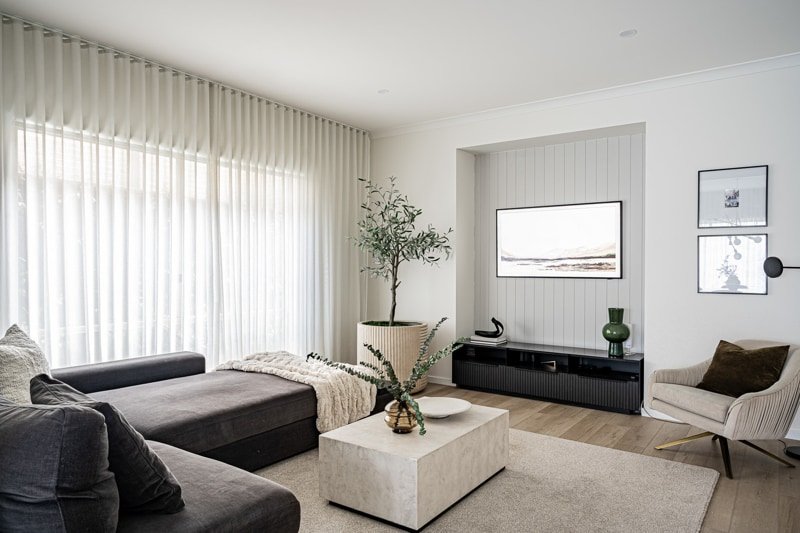 Living Area with White Sheer Curtains in Arabian Ranches