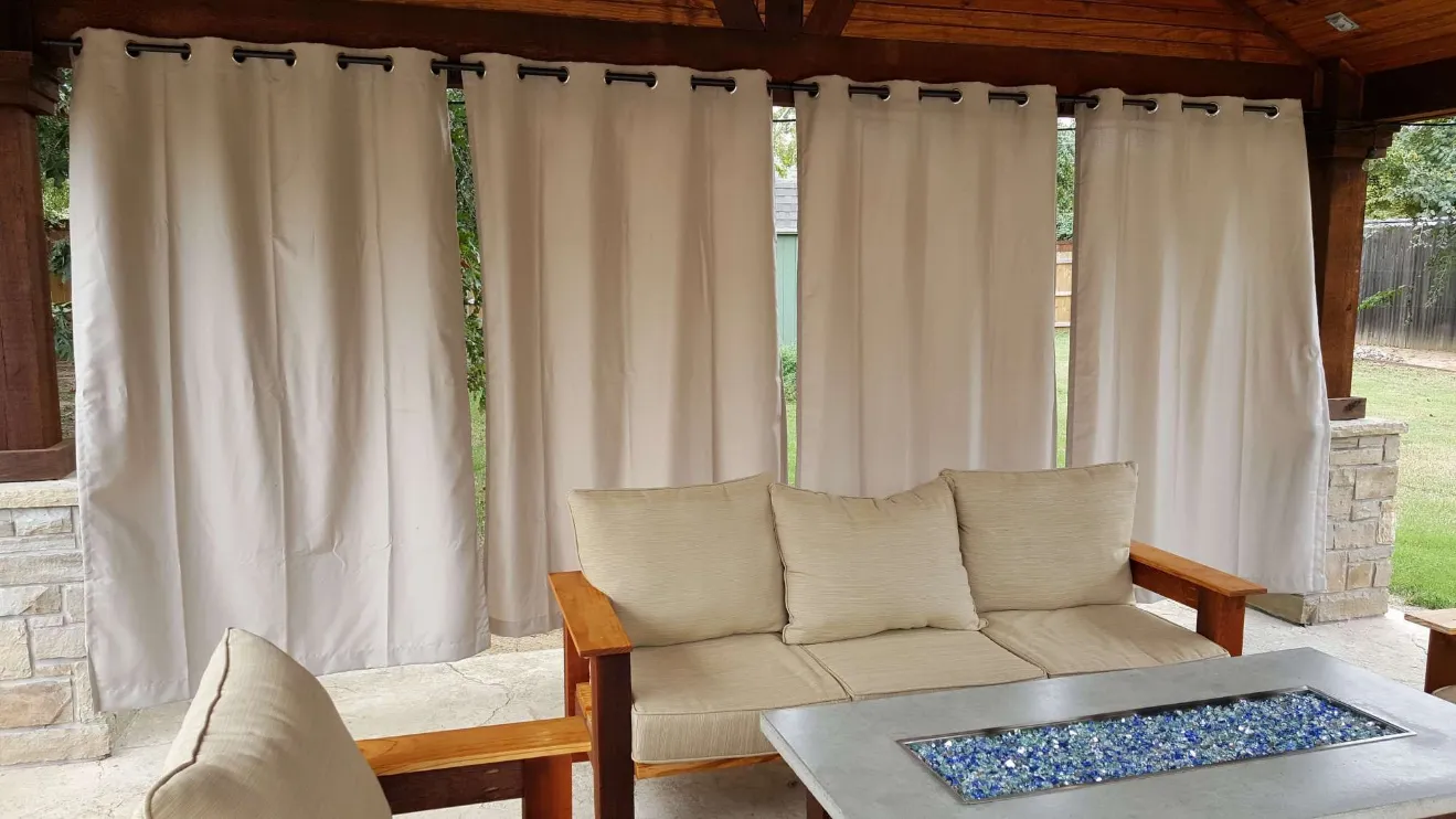 Outdoor Sheer Curtains in Wooden Patio Seating Area